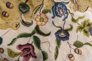 Alma Duseault hooking a rug started by Jeannie Zook