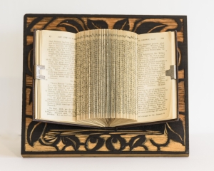 Folded book on Burnished Wood