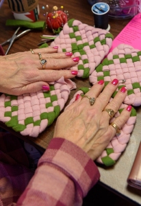 Bobbi Mahler's pink braided work and nail polish