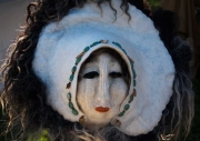 Mask of woman's face.