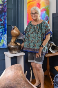 Catherine Gibson with her ceramic sculpture