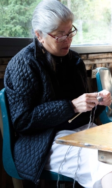 a knitter prepares