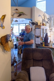 Hugh entering his work studio.
