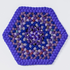 A purple braided mat: note the consistent braid widths.