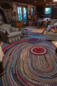 Another view of the sitting area and studio. Note the size of these rugs!