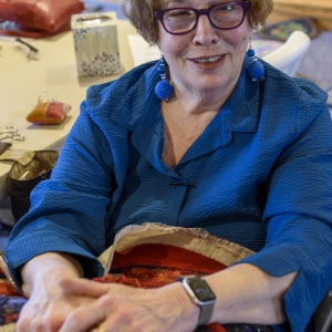 Jeni Nunnally enjoys the social aspects of hooking with a group. Jeni Nunnally enjoys the social aspects of hooking with a group.