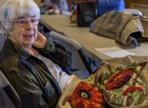 Peg Santora, South Berwick working on her "Summer Garden" poppies.