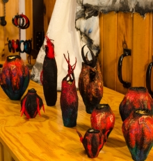 red and black felted vessels