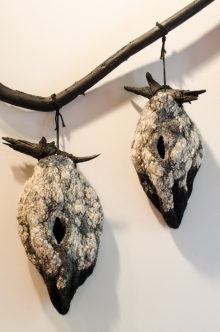 felted vessels adorn the walls