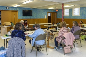 Tin Pedlars members begin to drift in to the meeting.