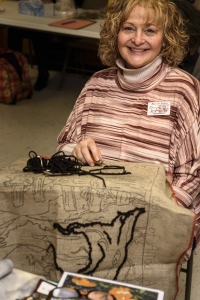 Pam Springer at work at the meeting.