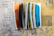 Book mounted on artwork.