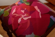 This needlepoint chair is one of several Judy designed, made, and uses in her dining room.