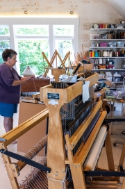 Nina prepares a warp for her Macomber loom.